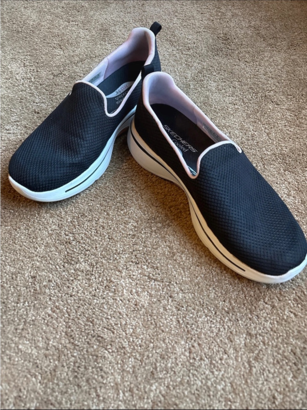 Skechers Black Slip-On Sneakers with White Sole and Pink Lining